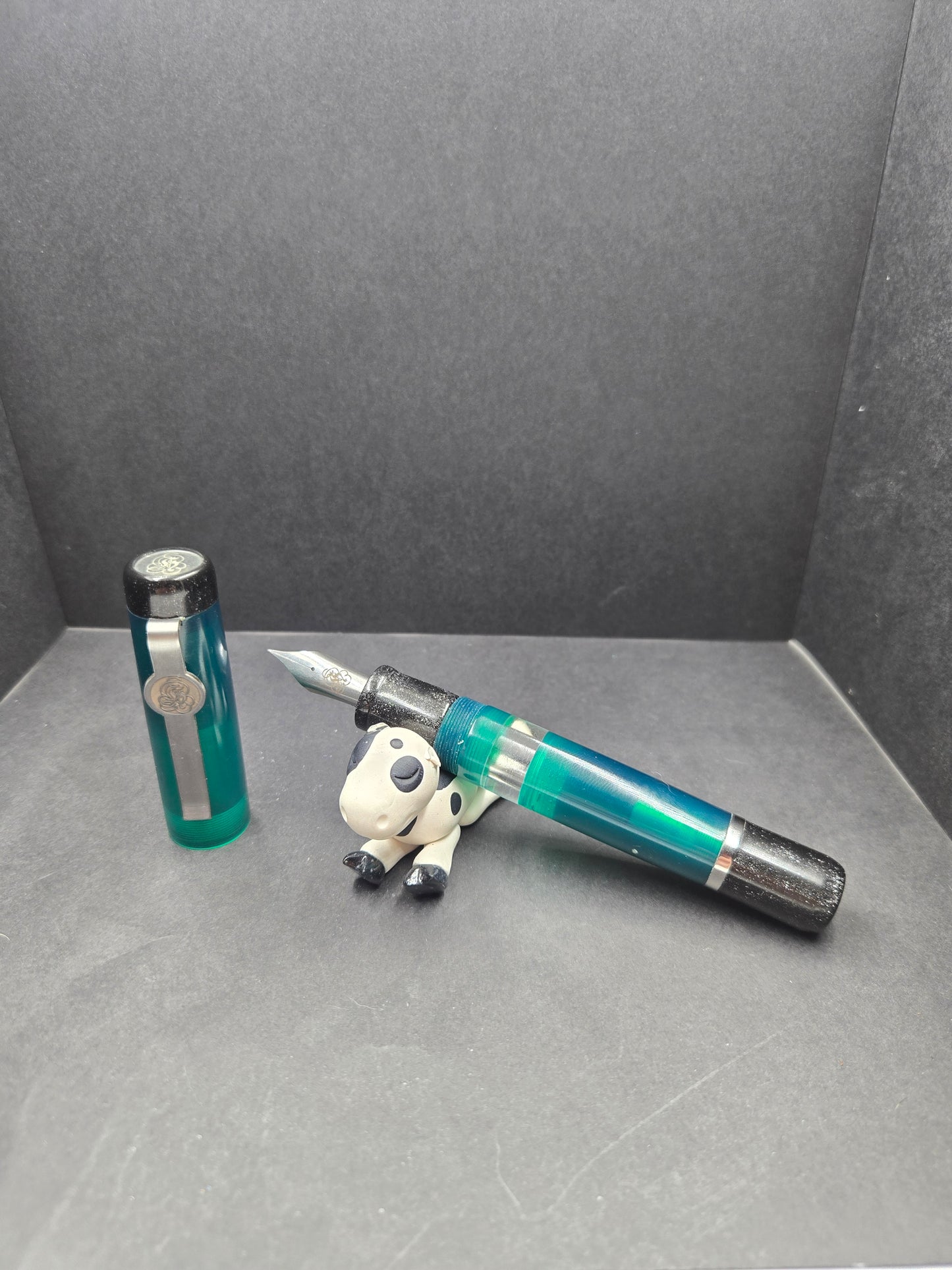 B46 - König - Translucent Forrest Green w/Black trim