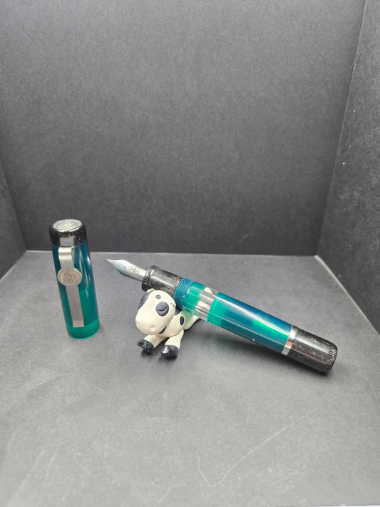 B46 - König - Translucent Forrest Green w/Black trim