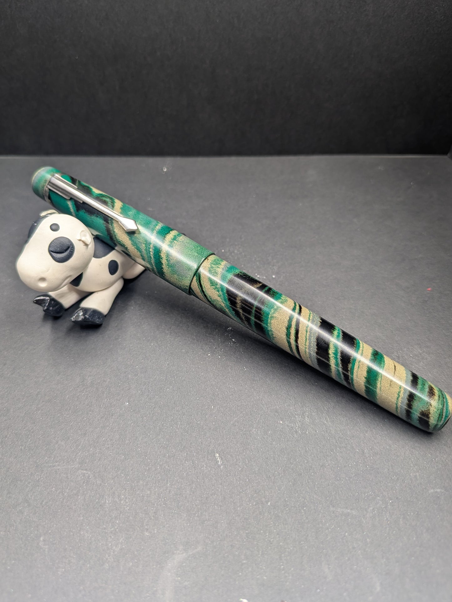 F24 - The Americana - Custom Nikko (teal, tan, grey, black) mottled