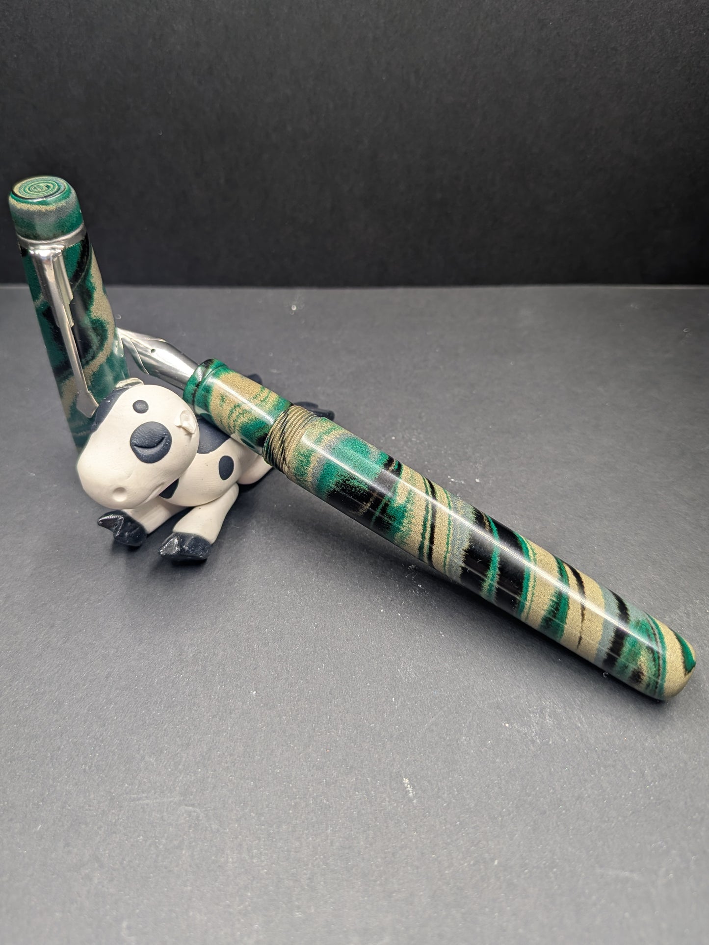 F24 - The Americana - Custom Nikko (teal, tan, grey, black) mottled