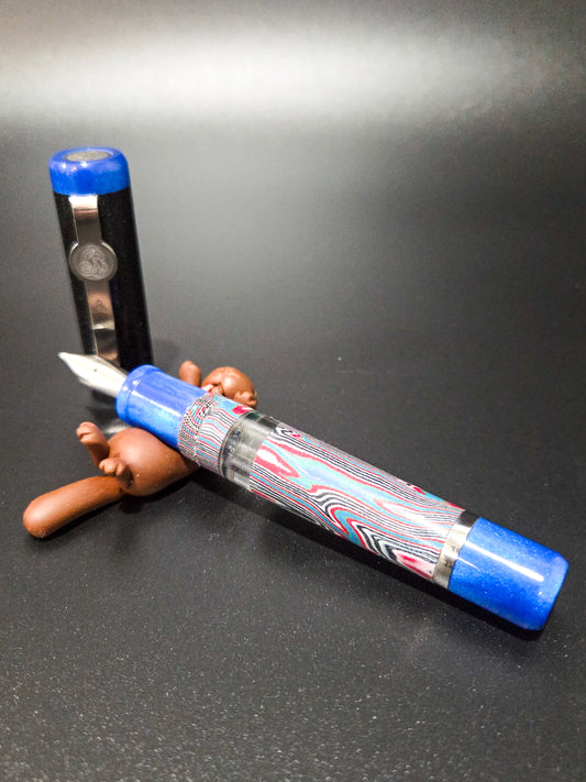 B46 - König - Crazy Fiber Faux Fordite - Piston Filler - Blue/Black trim