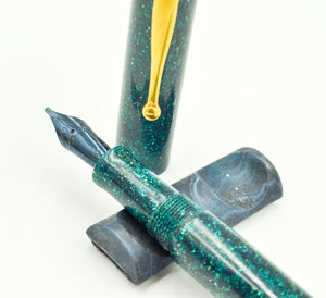 M834A - Teal honeycomb demonstrator with Ebonite accents - Jowo 1.1 two tone ( Black Ruthenium -Rhodium)